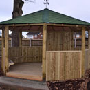 Outdoor wooden gazebo at Chester school